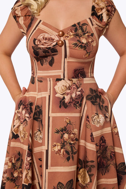 Dolores Framed Roses Doll Brown Dress