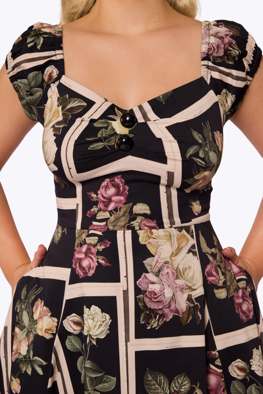 Dolores Framed Roses Doll Black Dress